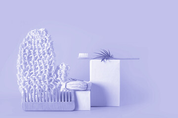 Set with organic eco tools for spa and facial care on podium. Very Peri - color of the year 2022