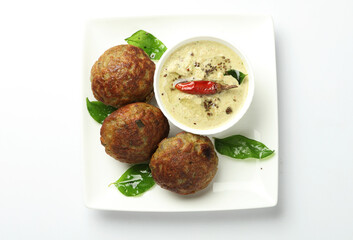 Kuzhi Paniyaram GREEN GRAM served with coconut chutney and sambar- South Indian breakfast