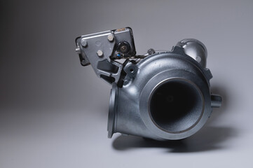 New car parts turbocharged, on a light background.