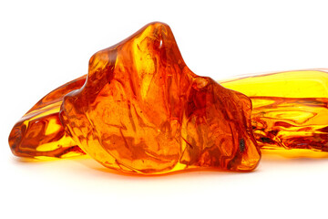 Pieces of landscape amber on a white background. Natural patterns on fossilized resin. Copal. Natural mineral. Jewelry material. Sun stone. Semi-precious crystal. Ornamentation. 