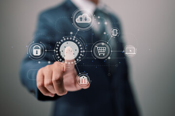 On a virtual screen, a businessman touches a fingerprint scanner to provide a secure interface for online shopping, banking, and cloud computing.