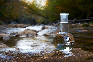 Clean drinking water. Flask with water.