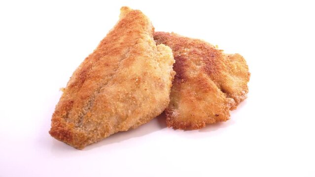 Fried Fish Fillet - Food on a turntable isolated on white background