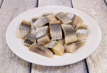 Mediterranean herring fillet served on a plate on the table