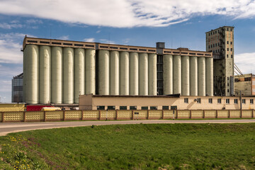 agro silos granary elevator with seeds cleaning line on agro-processing manufacturing plant for processing drying cleaning and storage of agricultural products, flour, cereals and grain.