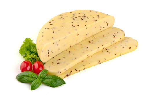 Traditional Latvian homemade cheese with cumin seeds for annual Latvian festival celebrating the summer solstice Ligo holiday. Isolated on white background.