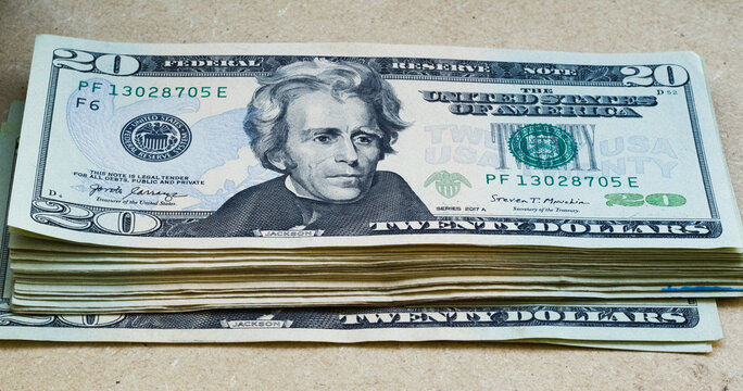 Full US 20 dollar bills stacked with Andrew Jackson
