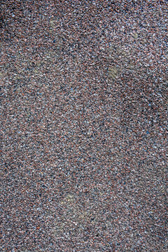 Leaf of granular ruberoid close up. Texture