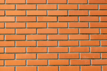The red brick wall texture background is neatly arranged