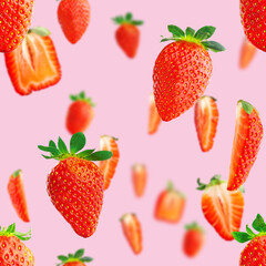 Fresh strawberry seamless pattern. Ripe strawberries isolated on pink. Package design background. Falling strawberry selective focus.