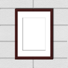 Mock up: brown frame with passe-partout on grey brick wall. - 507131049