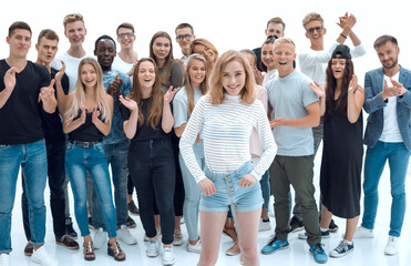 Obraz premium large team of youth applauding their leader .