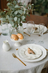 Aesthetics table setting for breakfast. Stylish home decorations.