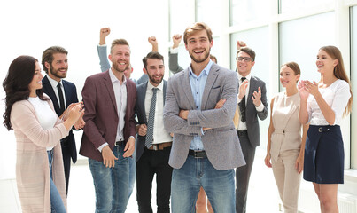Fototapeta na wymiar happy business team congratulating their leader . success concept