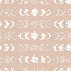 Seamless pattern of moon phases with floral elements.