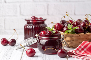 Jars with freshly homemade cherry jam