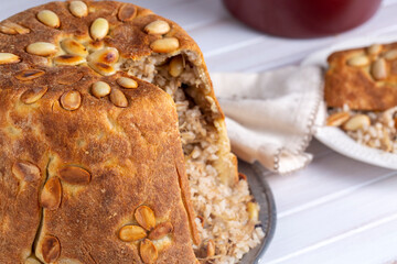 Turkish Perde Pilavi. Drape pilaf with chicken, almond and raisin. A local flavor Rice from Siirt region (Turkish name; Siirt perde pilavi)