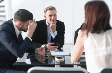 Group of business people brainstorming together