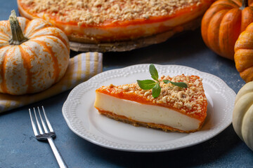 Handmade delicious pumpkin cheesecake and small pumpkins, Turkish name; balkabakli cheesecake