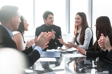 Businesspeople discussing together in conference room