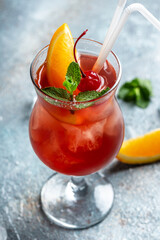 Fresh cherry cocktail with cherry and ice cubes. Glass of cherry soda drink, Summer dessert. Healthy diet food. vertical image. place for text