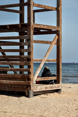 Lifeguard tower in Loutsa beach (Artemida) in Athens, Greece, featuring evening Greek archipelago views of the aegean sea