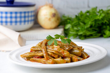 Traditional delicious Turkish food; Green beans with olive oil; Turkish name; Zeytinyagli taze fasulye