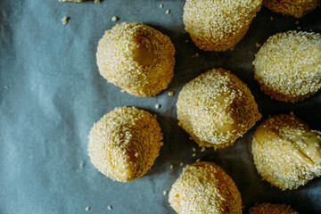 pastry top view, fresh hot sesame buns for breakfast
