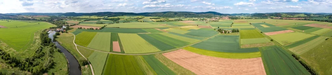 Selbstklebende Fototapeten landscape with field in the werra valley between Hesse and Thuringia at Herleshausen © hecke71