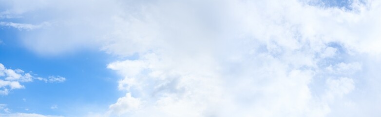 Blue sky with clouds. Sky background. Selective focus. Panorama