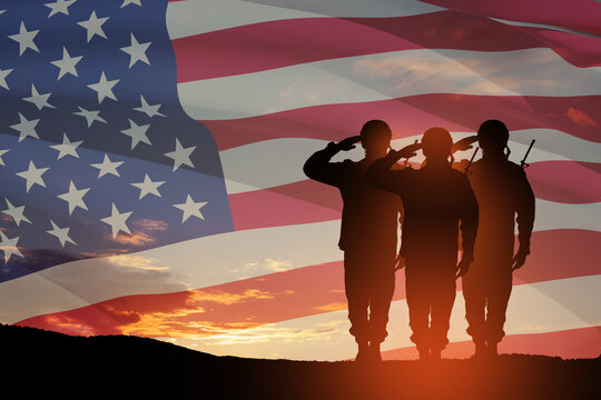 USA army soldiers saluting on a background of sunset or sunrise and USA flag. Greeting card for Veterans Day, Memorial Day, Independence Day. America celebration. 3D-rendering.