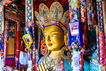 Beautiful and respectful golden buddha statue (Maitreya Buddha statue) in Thiksey monastery temple , Leh-Ladakh , India