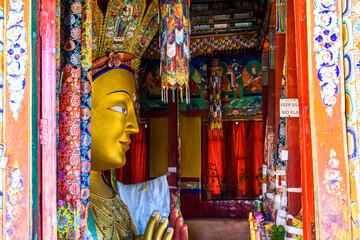 Beautiful and respectful golden buddha statue (Maitreya Buddha statue) in Thiksey monastery temple...