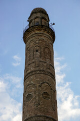Artuklu Mardin, Turkey 7 May 2022 Mardin landscape at sunset with minaret of Ulu Cami, also known...