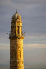 Artuklu Mardin, Turkey 7 May 2022 Mardin landscape at sunset with minaret of Ulu Cami, also known...