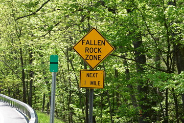 Fallen rock zone highway warning sign