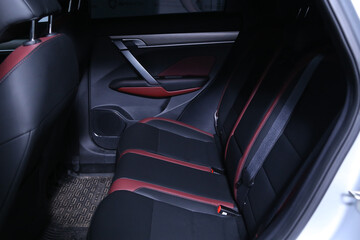 Back passenger seats in modern luxury car. Leather and Alcantara Car Seats. - obrazy, fototapety, plakaty
