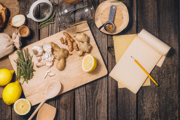 Alternative medicine - tincture preparation. Ancient, natural herbal methods of illness treatment. Old wooden floor background with copy space