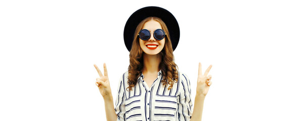 Portrait of beautiful smiling young woman wearing striped shirt and black round hat isolated on white background, blank copy space for advertising text