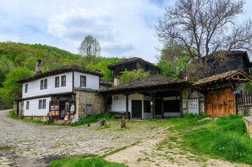 Fototapeta na wymiar Bozhentsi village in Bulgaria, Gabrovo Municipality. Old house with preserved architecture.