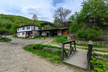 Fototapeta na wymiar Bozhentsi village in Bulgaria, Gabrovo Municipality. Old house with preserved architecture.
