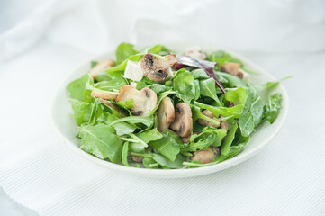 Spinach salad with mushrooms and feta cheese