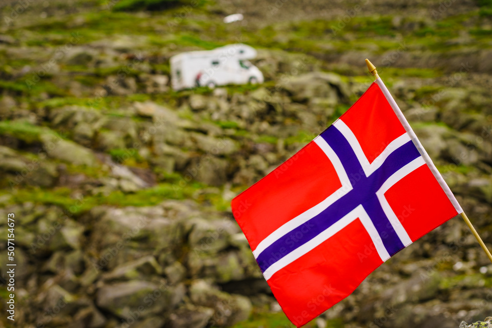 Sticker Norwegian flag and camper car in mountains