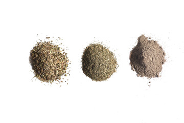 piles of different spices isolated on white background flat lay