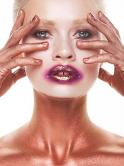 Young woman with fantasy bright make up.