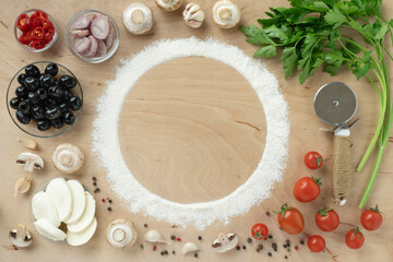Fototapeta na wymiar set of ingredients for making homemade pizza. Fresh cherry tomatoes and mushrooms, dough flour, mozzarella, olive oil and herbs, top view, copy space for your text