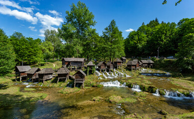Fototapeta na wymiar Historical wooden watermills near city Jajce, Bosnia and Herzegovina.