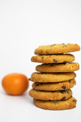 The cookie tower. A stack of chocolate chip cookies on a white background