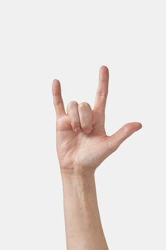 Sign language I love you gesture hand on white.