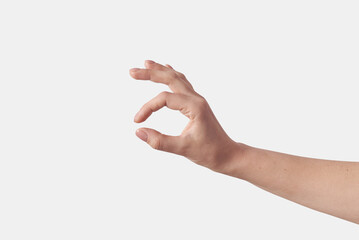 OK gesturing or measuring hands on white.